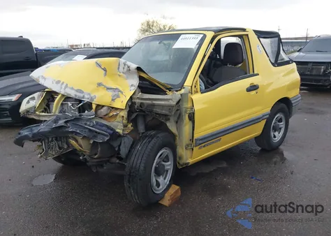 2003 Chevrolet Tracker z USA, uszkodzony, nr VIN 2CNBE18C736912372